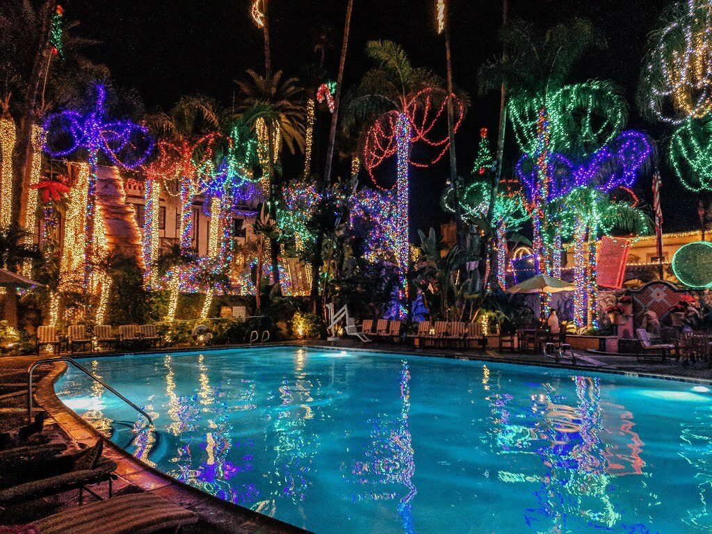 Lights reflecting off the hotel pool during the Mission Inn Festival of Lights