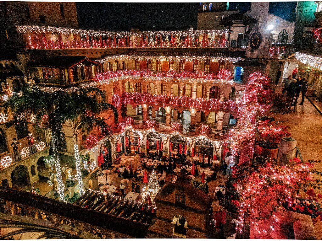 Illuminated rooftop courtyard view of the Mission Inn during the Festival of Lights