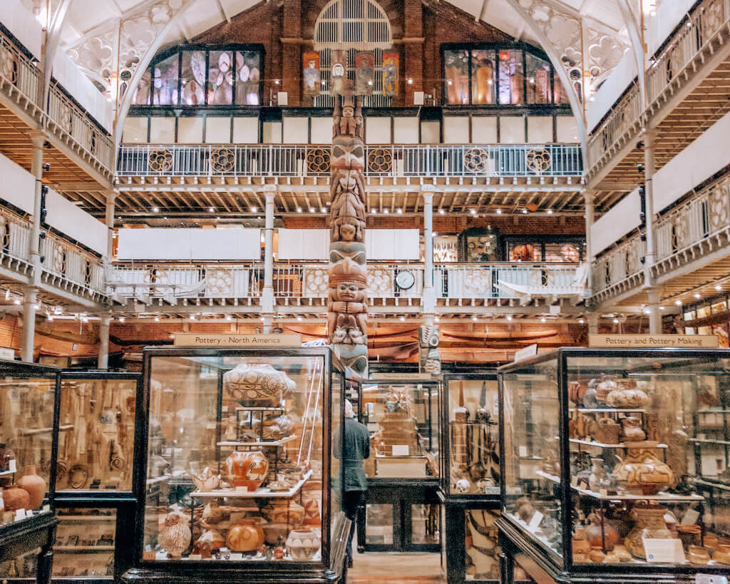 Pitt Rivers Museum jammed full of cabinets and artifacts