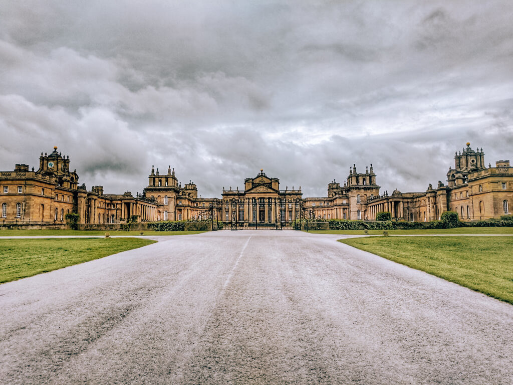 Road leading to the elaborate stone Blenheim  Palace
