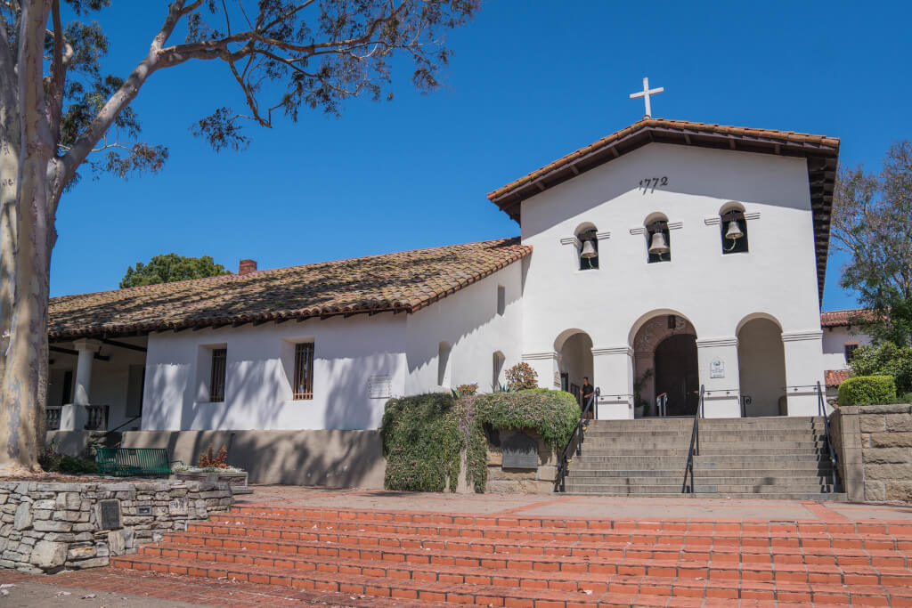 White building with red roof that is the Mission San Luis Obispo de Tolosa in San Luis Obispo